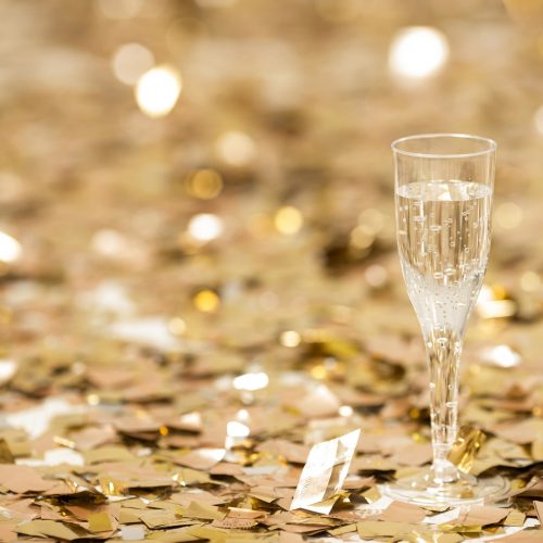 close-up-view-of-champagne-glass-with-confetti