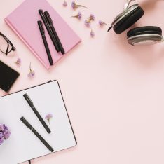 lavender-flower-bunch-cellphone-headphone-stationeries-pink-background